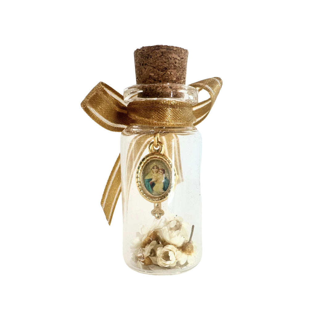 Pendants for chain: Virgin of Schoenstatt and cross.