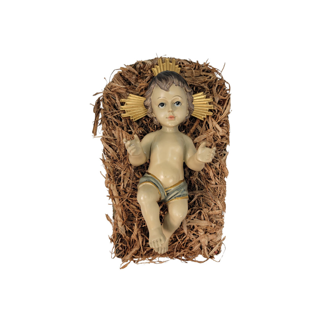 Baby Jesus Ceramic Figure on a Cradle. Size 10 x 7 in.