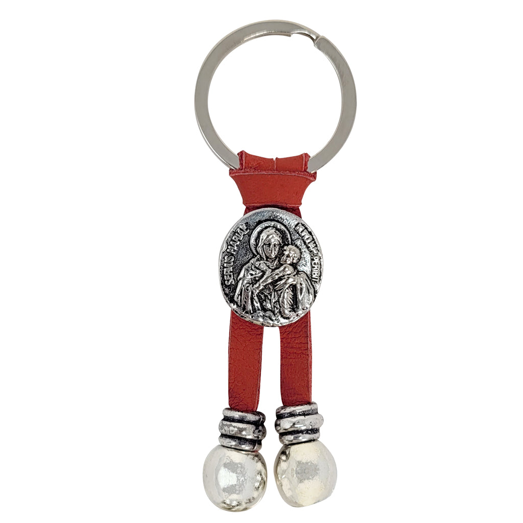 Argentine red leather keychain with image of the MTA in pewter. Our lady of Schoenstatt. 3.7 